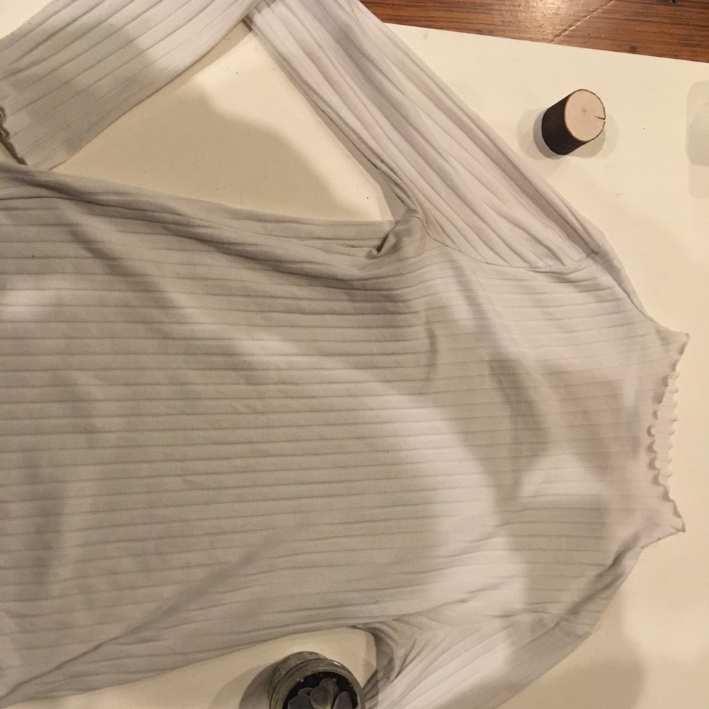 White ruffled mock turtleneck